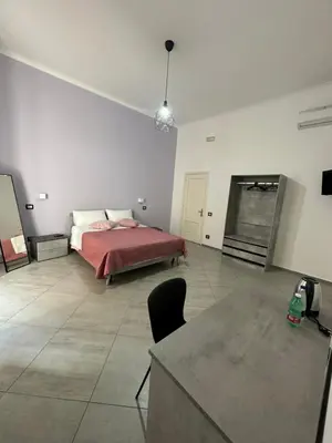 Letto o letti in una camera di Carmè Guest House
