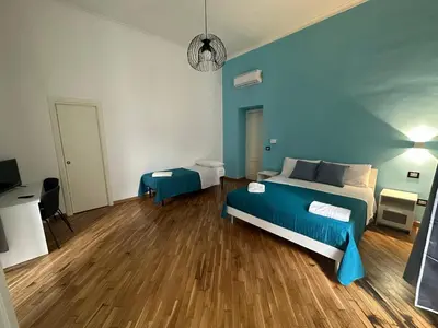 Letto o letti in una camera di Carmè Guest House