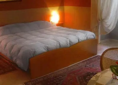 Letto o letti in una camera di Dreaming of Naples