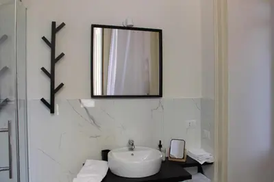 Bagno di Corso vista mare - Casa Elegante by Italianhost