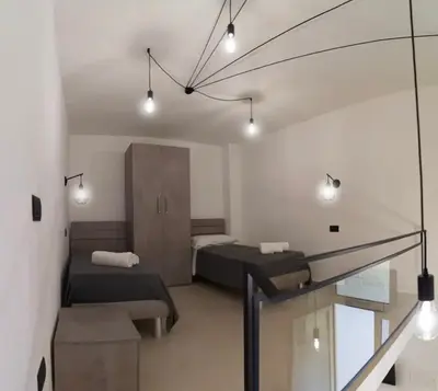Letto o letti in una camera di B&B Vittoria