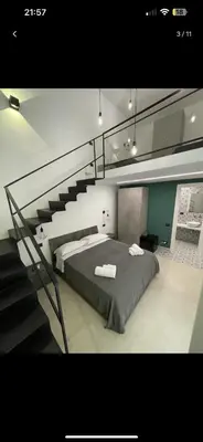Letto o letti in una camera di B&B Vittoria