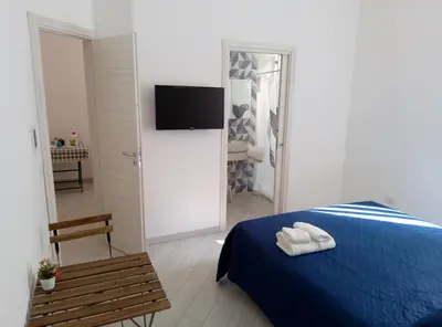 Letto o letti in una camera di Rooms add e criatur