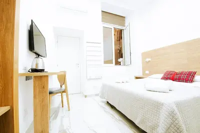 Letto o letti in una camera di Light