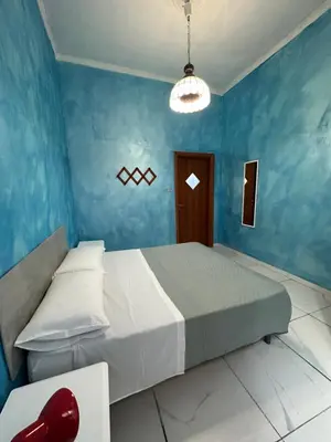 Letto o letti in una camera di Holiday House Clara&Vincenzo