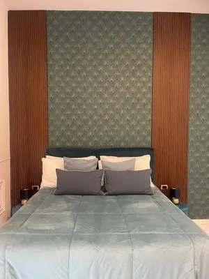 Letto o letti in una camera di DOMUS LUIGI LEONE 2