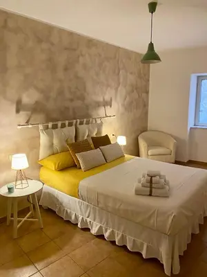 Letto o letti in una camera di Figurari Home Napoli-3 Deluxe