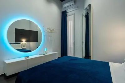 Letto o letti in una camera di Skyhouse Chiatamone
