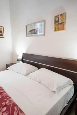 Letto o letti in una camera di Pazzariello House By Dimorra