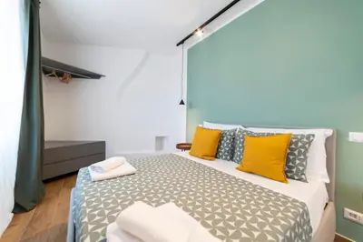 Letto o letti in una camera di Il Vicoletto Maiorani 39