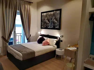Letto o letti in una camera di Grande Archivio Napoli 22