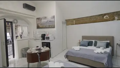 Letto o letti in una camera di Rebby Home