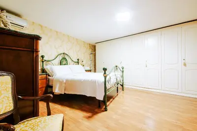 Letto o letti in una camera di La casa di Nina
