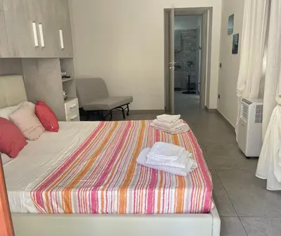 Letto o letti in una camera di La Piazzetta