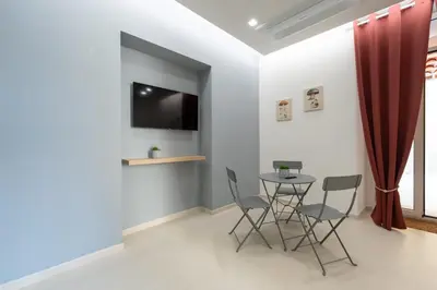 TV o dispositivi per l'intrattenimento presso Napoli Maison Suite
