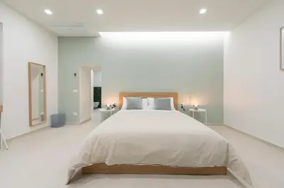 Letto o letti in una camera di Napoli Maison Suite