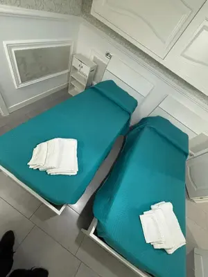 Letto o letti in una camera di Minerva