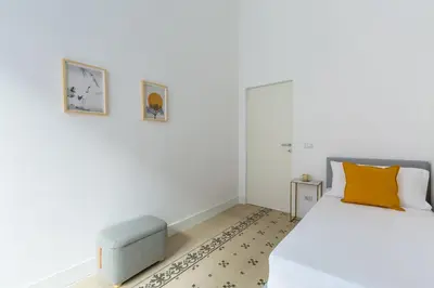 Letto o letti in una camera di Piazza Amedeo Stylish Apartment by Wonderful Italy