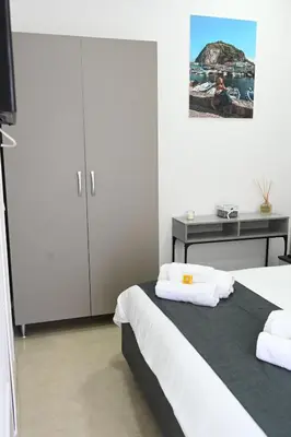 Letto o letti in una camera di Solymar B&B