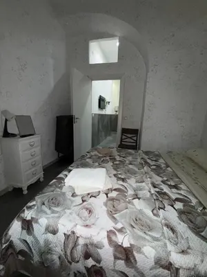 Letto o letti in una camera di Casa Favolosa