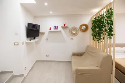 TV o dispositivi per l'intrattenimento presso Il Basso Mini Apartment