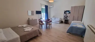 Letto o letti in una camera di Keira house Napoli