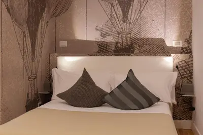 Letto o letti in una camera di Pignatelli Rooms