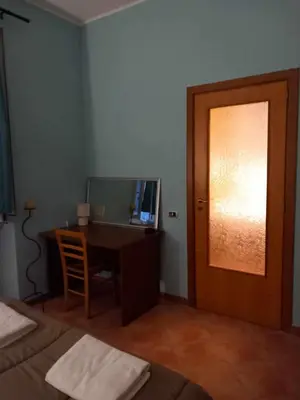 Letto o letti in una camera di Casetta Palmarice Centro Storico