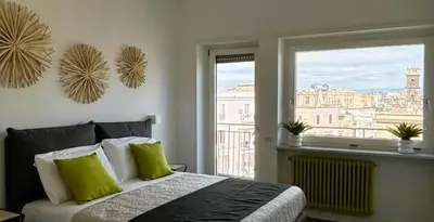 Letto o letti in una camera di Casa Malo' Duomo - Panoramic Luxury House