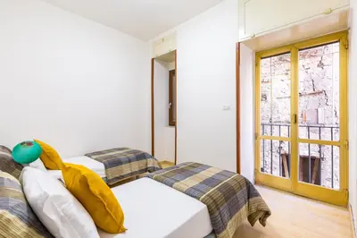Letto o letti in una camera di Al Borgo Orefici Apartment by Wonderful Italy