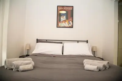 Letto o letti in una camera di B&B 4CELLA