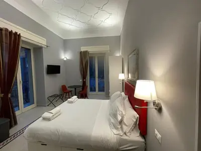 Letto o letti in una camera di La Cornucopia