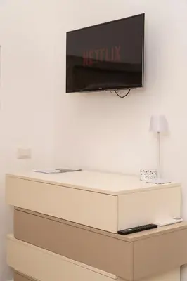 TV o dispositivi per l'intrattenimento presso Appartamento nel Cuore di Napoli - Centro Storico - Duomo Holiday