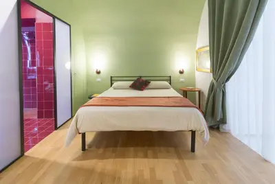 Letto o letti in una camera di A Casa Nostra