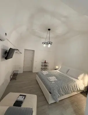 Letto o letti in una camera di Casa Baglioni