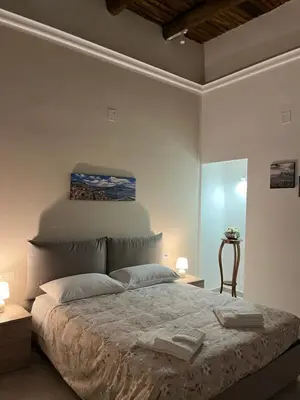 Letto o letti in una camera di Neapolis francy Vesuvio