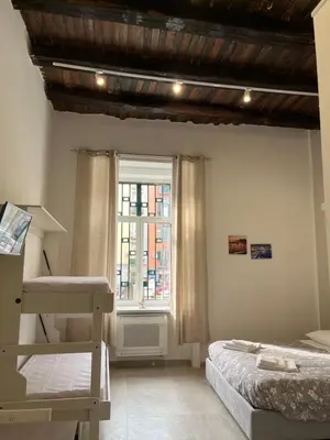 Letto o letti in una camera di Neapolis Francy marechiaro