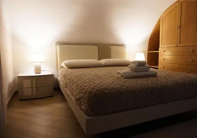 Letto o letti in una camera di MUSEO a 5 minuti dal Museo Archeologico e Centro Storico