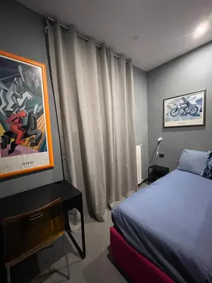 Letto o letti in una camera di Naples Luxury Suites B&B