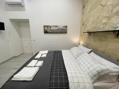 Letto o letti in una camera di CASA MASADA