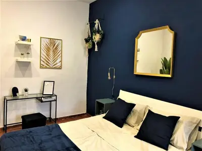 Letto o letti in una camera di Blu Decumano Apartment