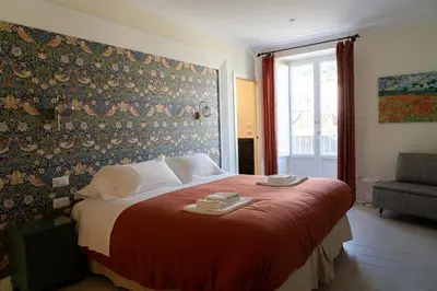Letto o letti in una camera di Domus Sibyllina, Palazzo Cavalcanti