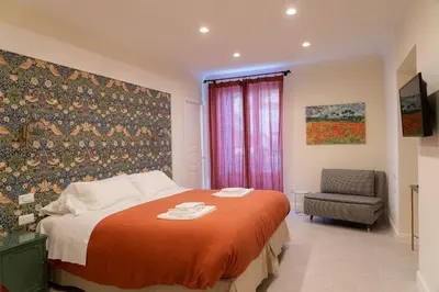 Letto o letti in una camera di Domus Sibyllina, Palazzo Cavalcanti