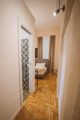 Letto o letti in una camera di Librai suite