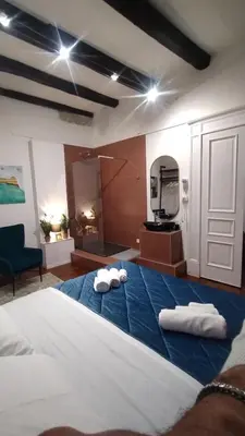 Letto o letti in una camera di Plebiscito Suite Apartment