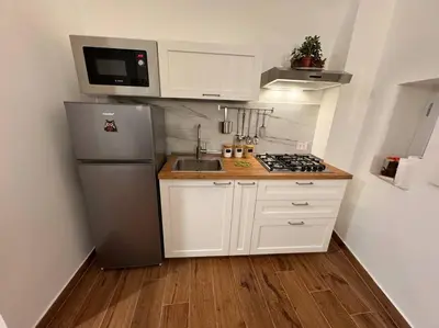 Cucina o angolo cottura di Domus Miraculi: Casa storica nel cuore di Napoli