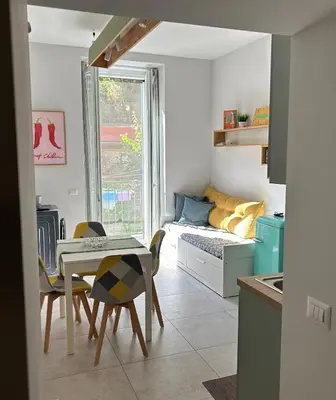 Letto o letti in una camera di Mirea Apartments - Napoli