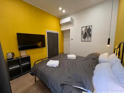 Letto o letti in una camera di Casa Imperatore