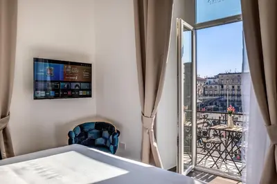 TV o dispositivi per l'intrattenimento presso ATAROOMS Suites Napoli