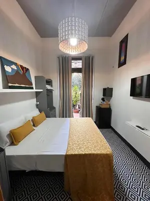 Letto o letti in una camera di La Casetta di Oppi